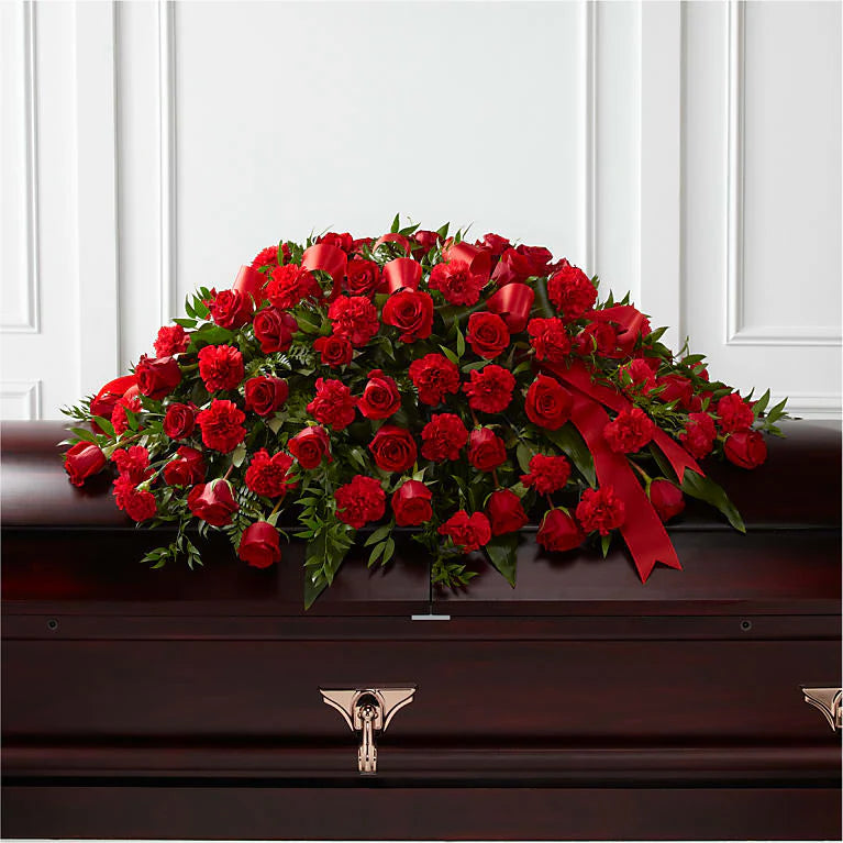 Premium Tribute of Life Cascade Casket Spray with delicate white flowers and a gentle cascade design, symbolizing peace and remembrance