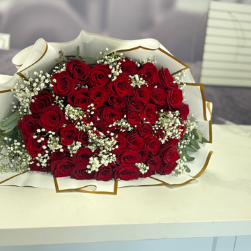 Red Roses and Baby Breath Bouquet