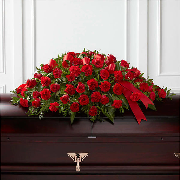 Premium Tribute of Life Cascade Casket Spray with delicate white flowers and a gentle cascade design, symbolizing peace and remembrance 
