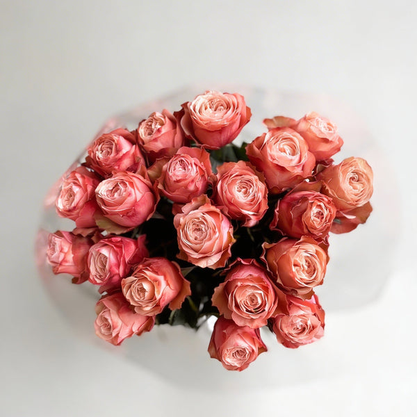 Bouquet of pink roses on a light gray background