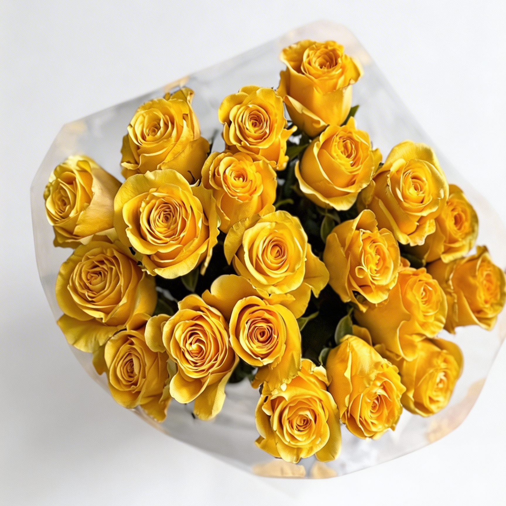 Bouquet of yellow roses in a clear plastic wrap on a white background