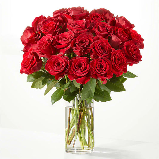 **Alt Text:**

"Minimalist long stem red roses arranged in a sleek glass vase, available in two sizes. Elegant and timeless, perfect for anniversaries, Valentine's Day, romantic gestures, and special occasions."