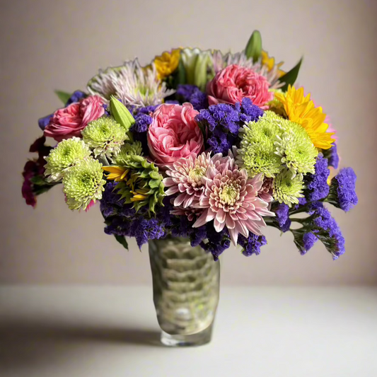 mixed flower arrangement in vase